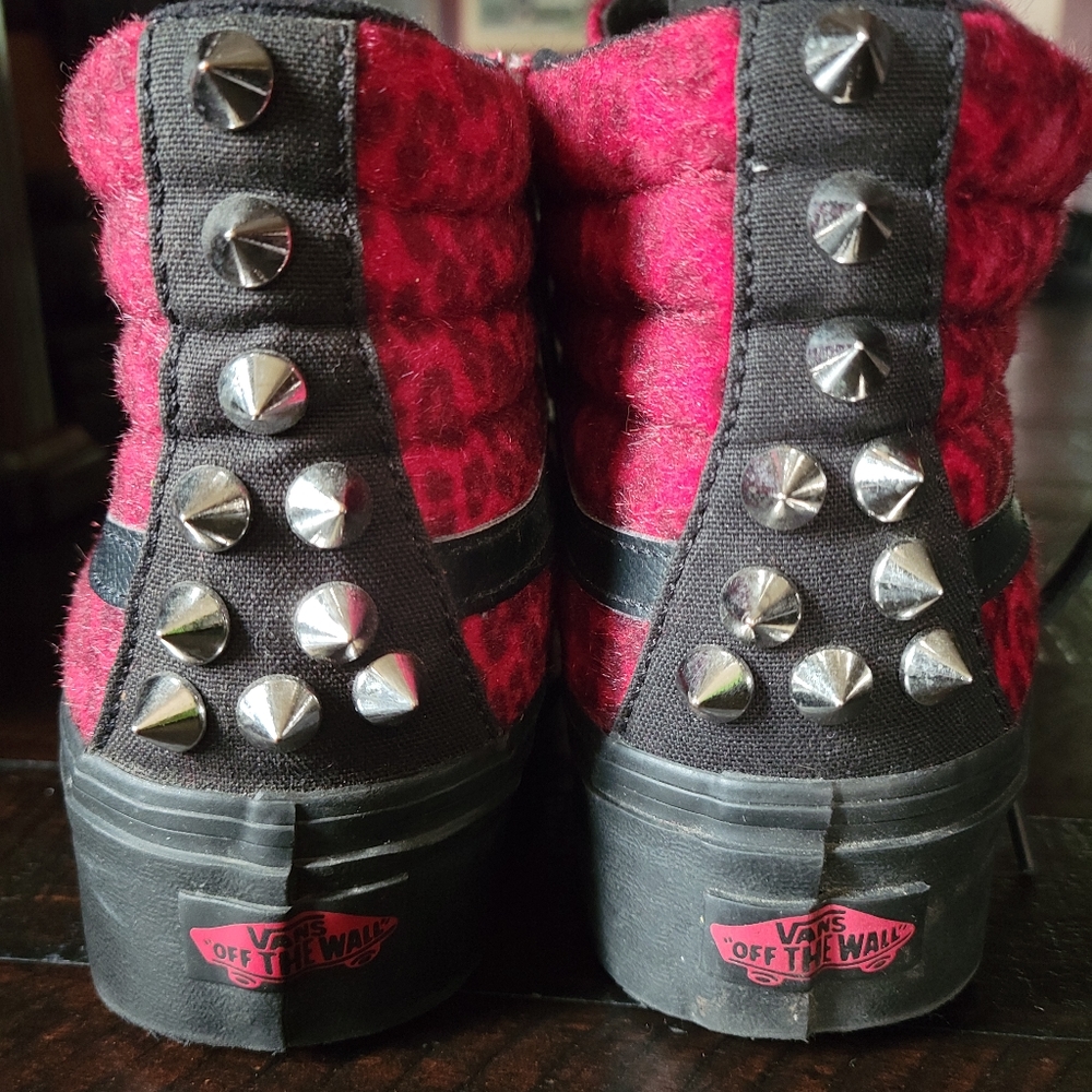 Vans red leopard print high tops.